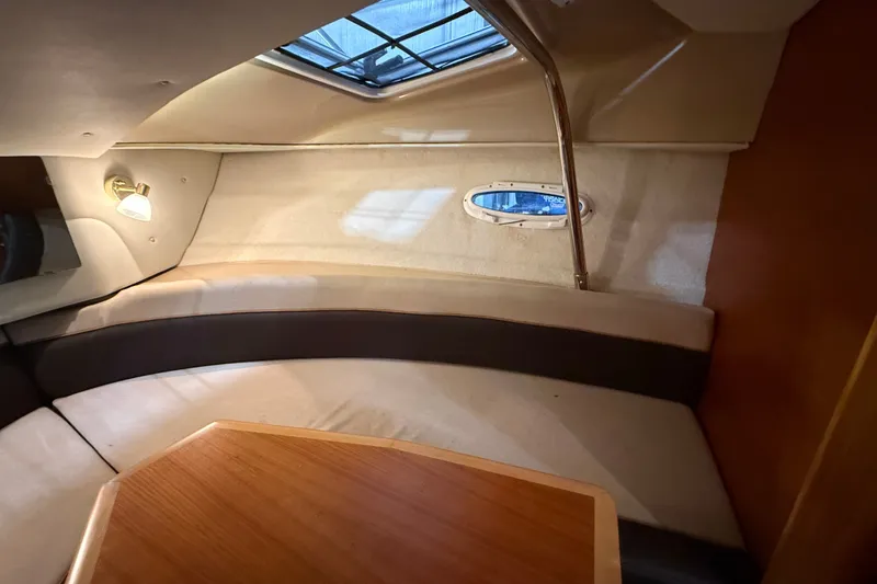 Slide: The Image of Interior cabin of 2016 Cutwater C-24 boat with seating and table. - 29