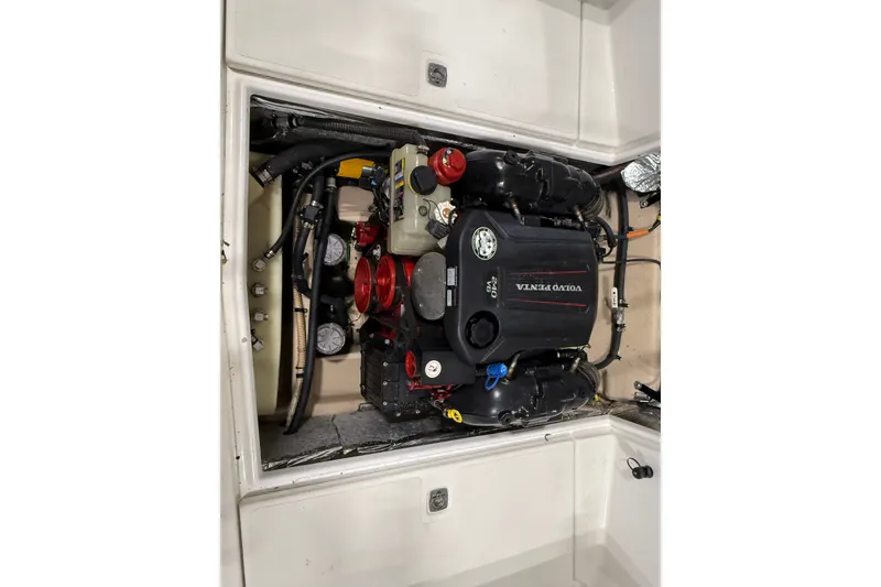 Slide: The Image of Engine compartment of a 2016 Cutwater C-24 boat featuring a Volvo Penta engine. - 40