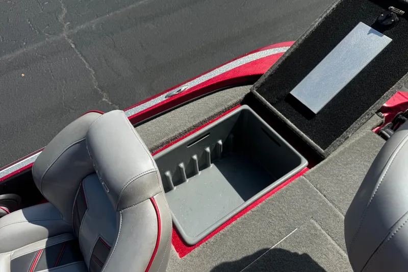 Slide: The Image of Interior of a 2018 Nitro Z18 boat showing storage compartment and seating. - 18