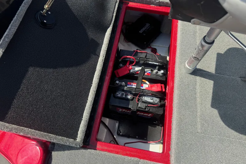 Slide: The Image of Battery compartment of a 2018 Nitro Z18 boat, featuring dual batteries and wiring. - 19