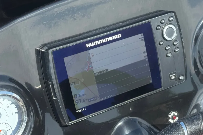 Slide: The Image of Humminbird Helix 7 fish finder on a 2018 Nitro Z18 boat dashboard. - 24