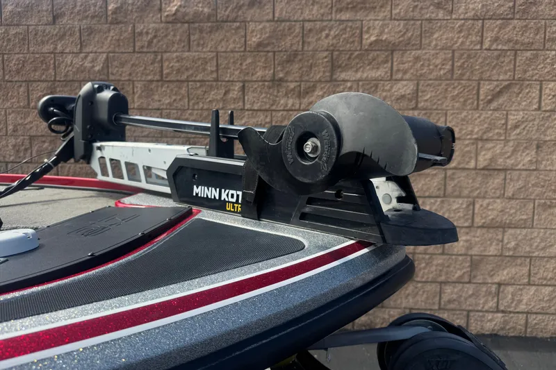 Slide: The Image of Minn Kota Ultrex trolling motor on 2018 Nitro Z18 boat, brick wall background. - 8