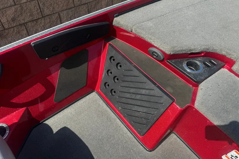 Slide: The Image of Interior of a 2018 Nitro Z18 boat, featuring red and gray design elements. - 13