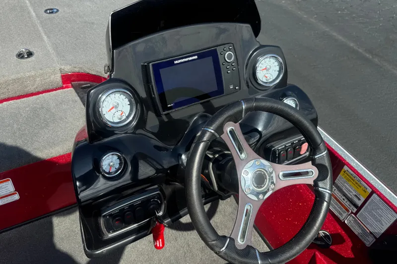 Slide: The Image of Steering console of a 2018 Nitro Z18 boat with gauges and a Humminbird display. - 23