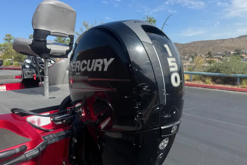 Slide: The Image of Nitro Z18 2018 boat with Mercury 150 FourStroke engine, parked outdoors. - 7