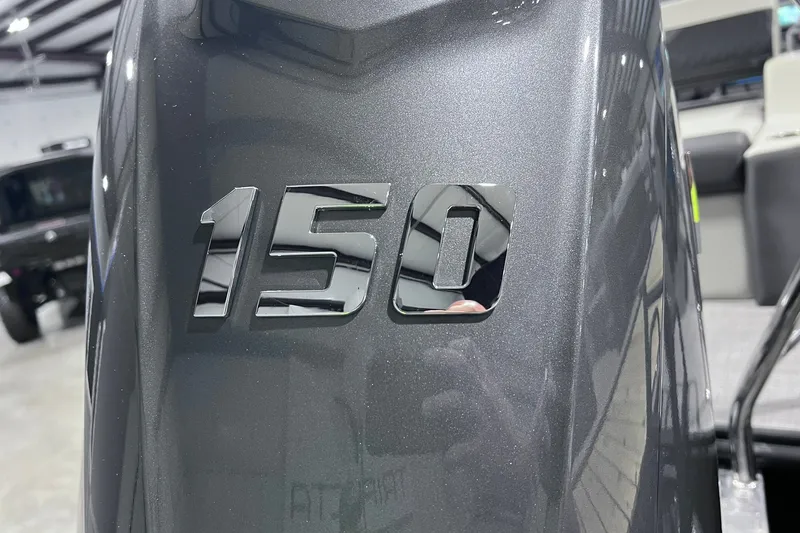 Slide: The Image of Close-up of 150 horsepower engine on 2026 Sylvan R-22 CLZ DH boat. - 20