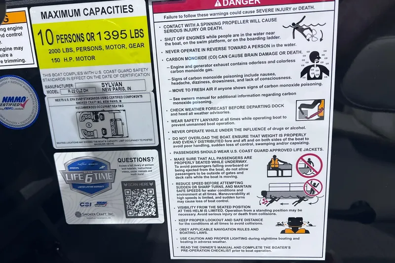 Slide: The Image of Warning and capacity labels on a 2026 Sylvan R-22 CLZ DH boat. - 17