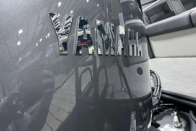 Slide: The Image of Yamaha engine on 2026 Sylvan R-22 CLZ DH boat, showcasing sleek design and branding. - 19