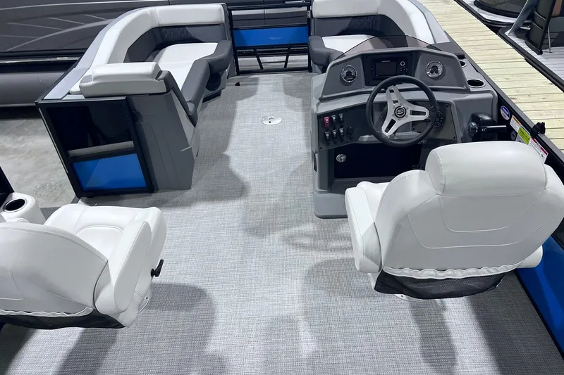 Slide: The Image of Interior of 2026 Sylvan R-22 CLZ DH pontoon boat with modern seating and helm. - 4