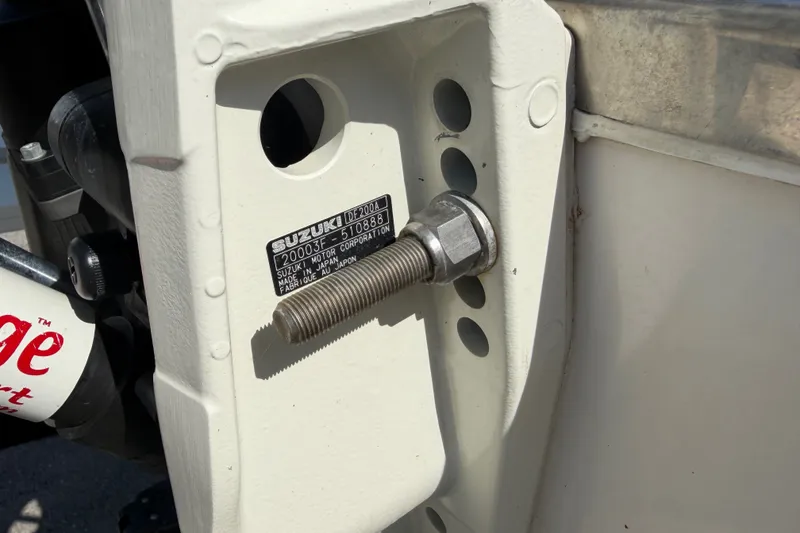Slide: The Image of Close-up of Suzuki DF200A engine mount on 1999 Robalo 2120 Center Console boat. - 28