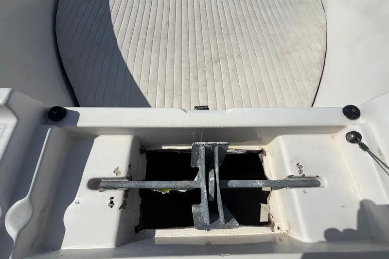 Slide: The Image of Anchor storage compartment on a 1999 Robalo 2120 Center Console boat. - 18