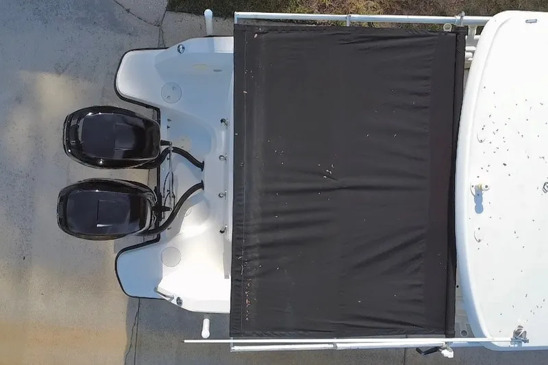Slide: The Image of Overhead view of a 2015 Boston Whaler 270 Vantage with dual outboard motors. - 39