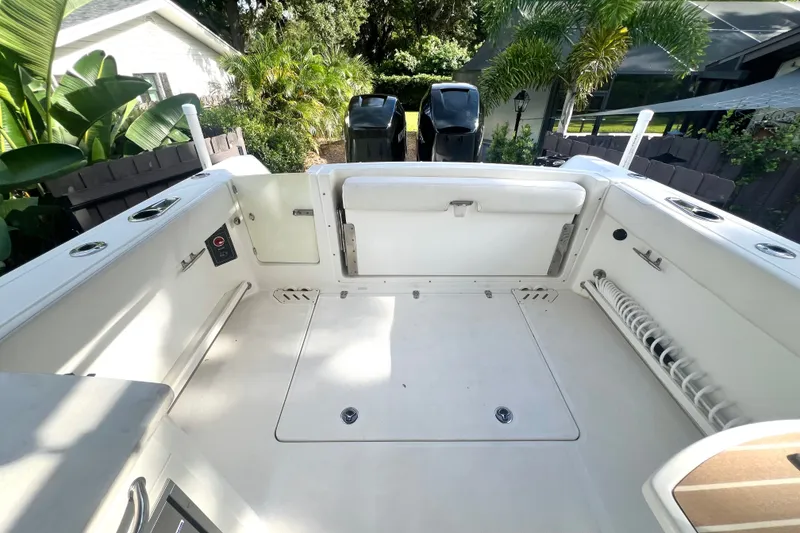 Slide: The Image of 2015 Boston Whaler 270 Vantage boat interior with spacious deck and seating area. - 50