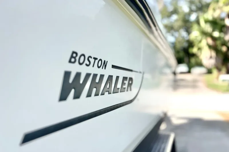Slide: The Image of Close-up of 2015 Boston Whaler 270 Vantage logo on boat hull. - 9