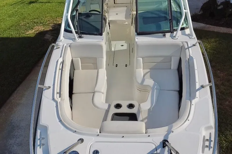 Slide: The Image of 2015 Boston Whaler 270 Vantage boat interior with spacious seating and cup holders. - 45