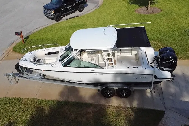 Slide: The Image of 2015 Boston Whaler 270 Vantage boat on trailer, parked in driveway, aerial view. - 29