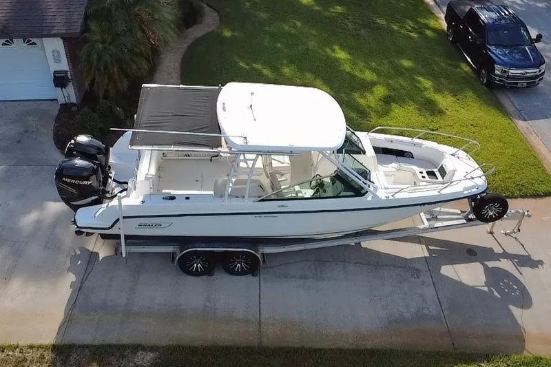 Slide: The Image of 2015 Boston Whaler 270 Vantage boat on trailer, parked in driveway, aerial view. - 34