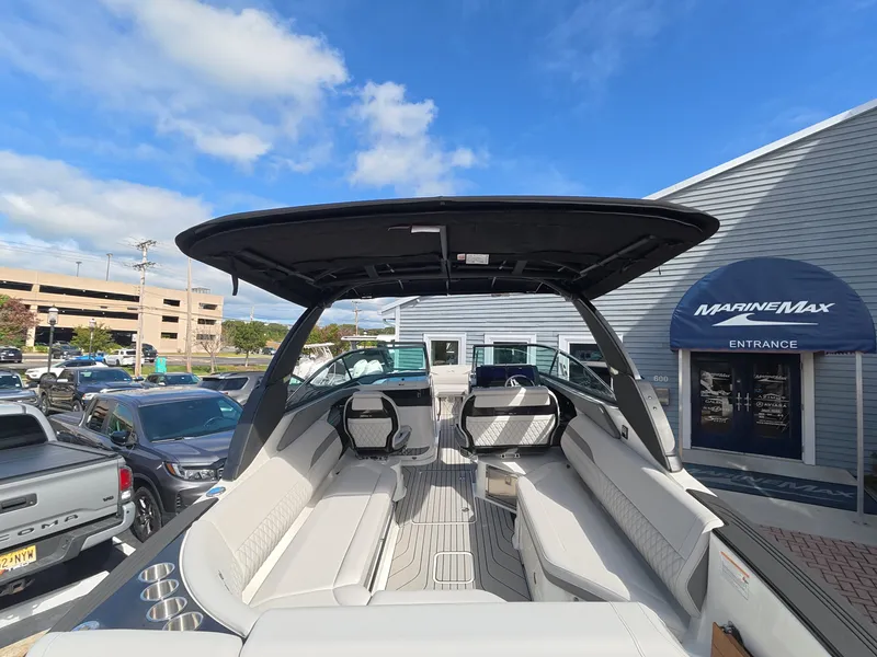 Slide: The Image of The image shows the spacious cockpit of a 2027 Sea Ray SLX 280 Outboard with sleek seating. - 22