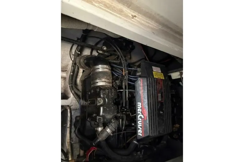 Slide: The Image of Engine compartment of a 1991 Carver 3067 Santego with MerCruiser components. - 24