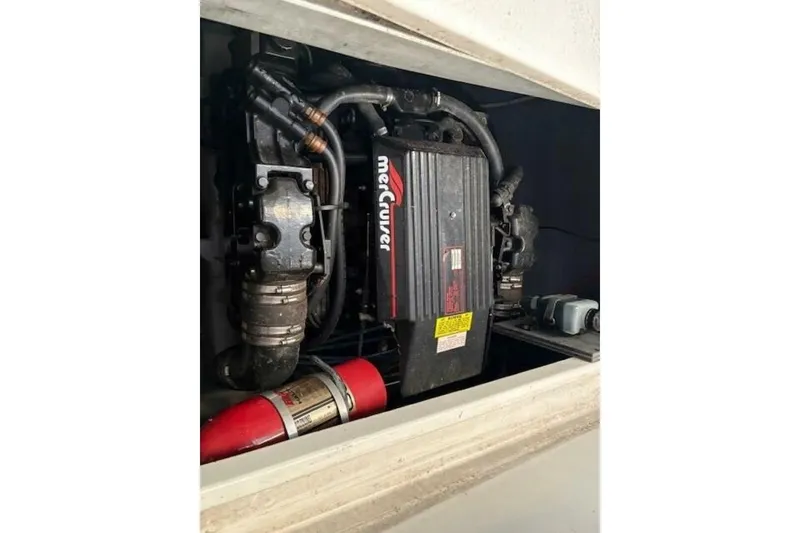 Slide: The Image of Engine compartment of a 1991 Carver 3067 Santego with MerCruiser components. - 25