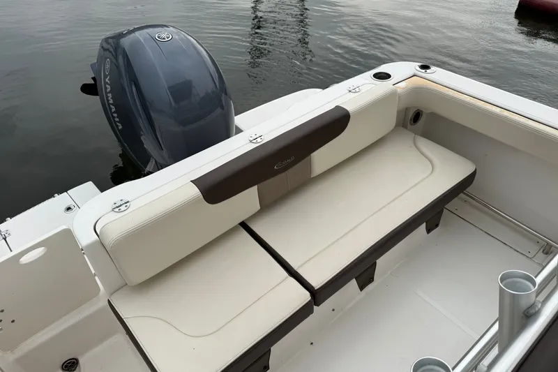 Slide: The Image of 2019 Robalo R222 Explorer boat with Yamaha engine, featuring comfortable seating. - 5