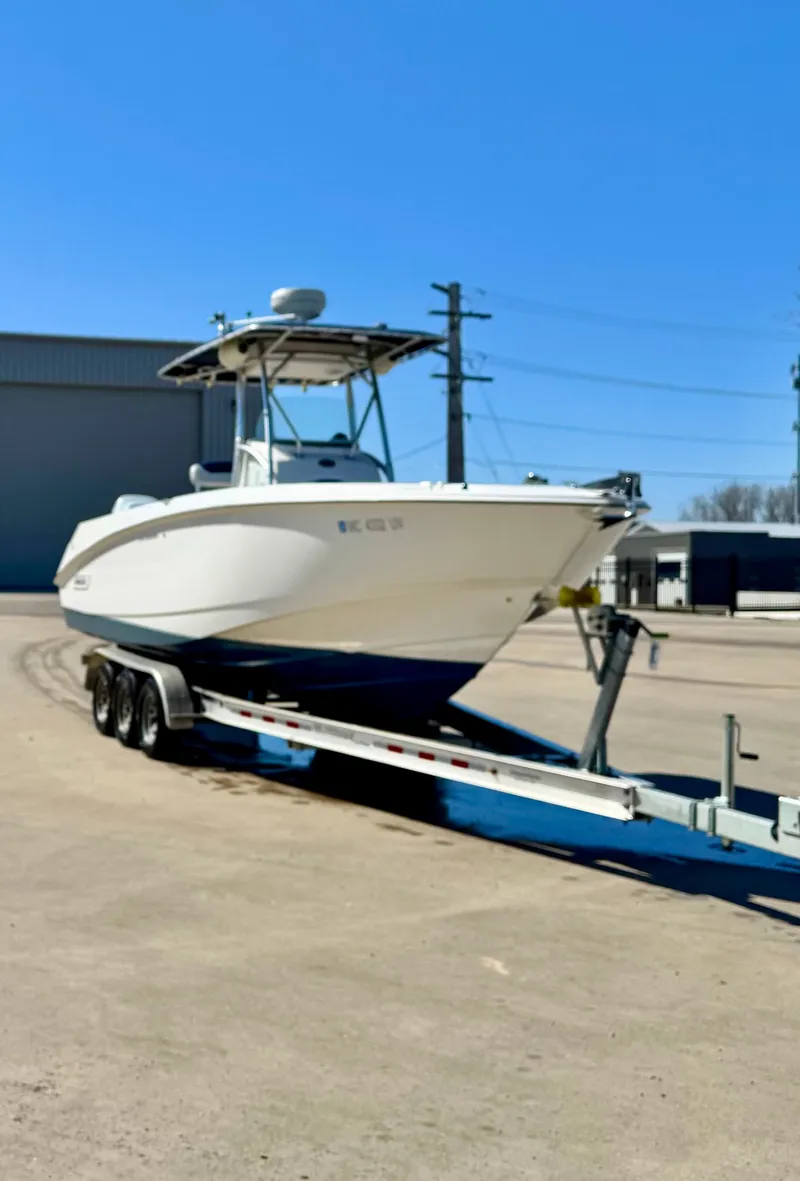 Slide: The Image of A 2004 Boston Whaler 270 Outrage on a trailer, ready for transport. - 1