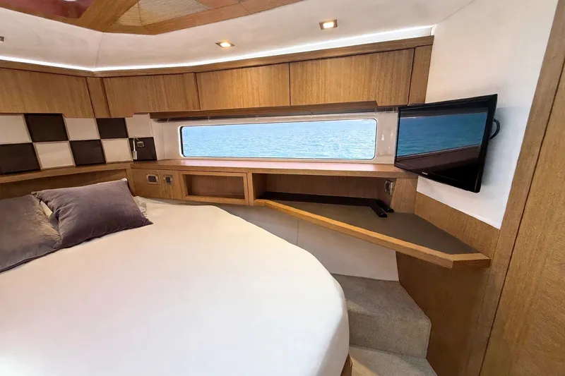 Slide: The Image of Luxurious interior cabin of 2019 Galeon 485 HTS yacht with wood finish and sea view. - 22