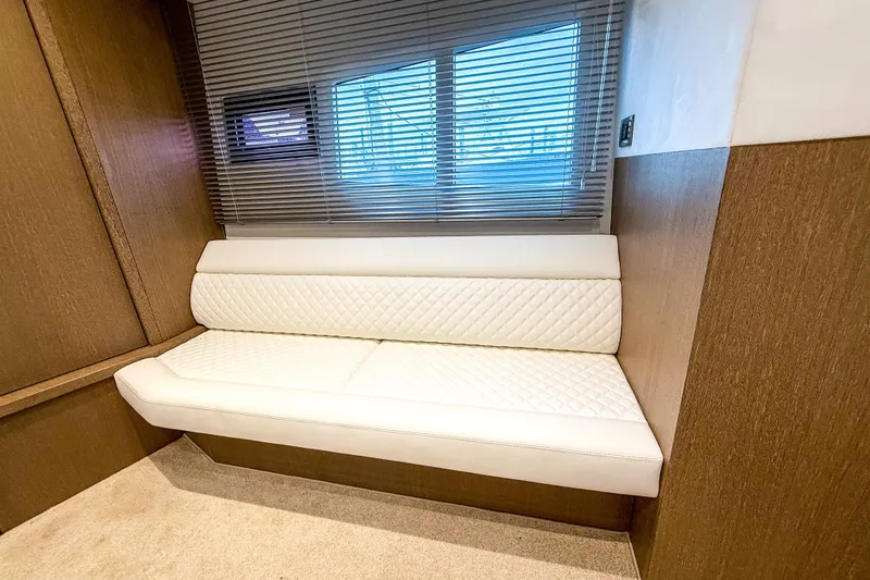 Slide: The Image of Luxurious interior of 2019 Galeon 485 HTS yacht with white quilted seating. - 19