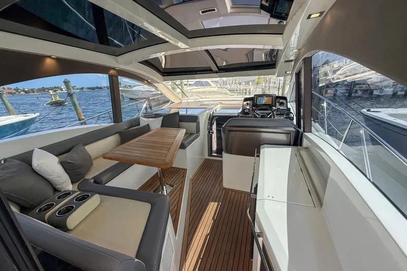 Slide: The Image of Luxurious interior of 2019 Galeon 485 HTS yacht with elegant seating and wooden flooring. - 9