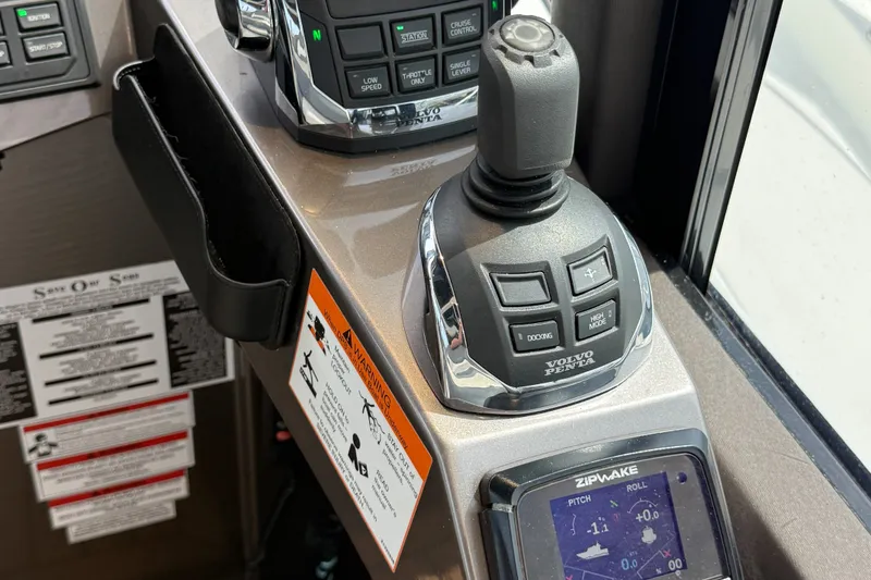 Slide: The Image of Control panel of 2019 Galeon 485 HTS with Volvo Penta joystick and Zipwake display. - 12