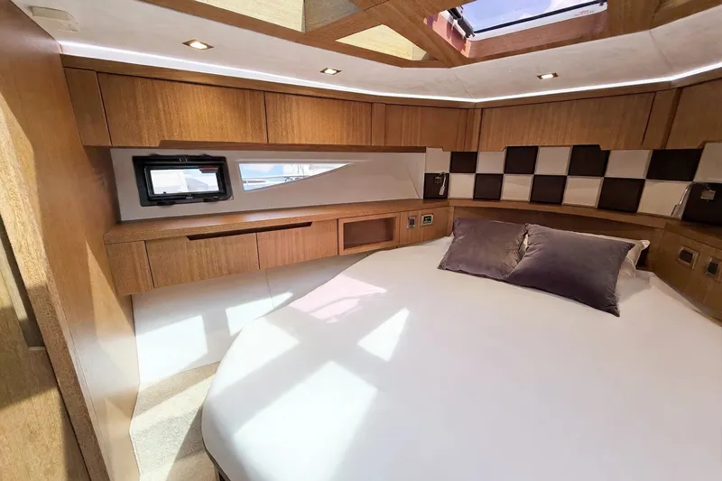 Slide: The Image of Luxurious interior cabin of 2019 Galeon 485 HTS yacht with modern wood finish. - 23