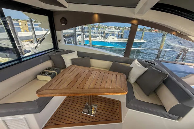 Slide: The Image of Luxurious seating area on 2019 Galeon 485 HTS yacht with waterfront view. - 10