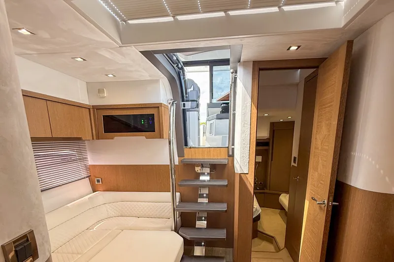 Slide: The Image of Luxurious interior of 2019 Galeon 485 HTS yacht with modern design and wooden finishes. - 15