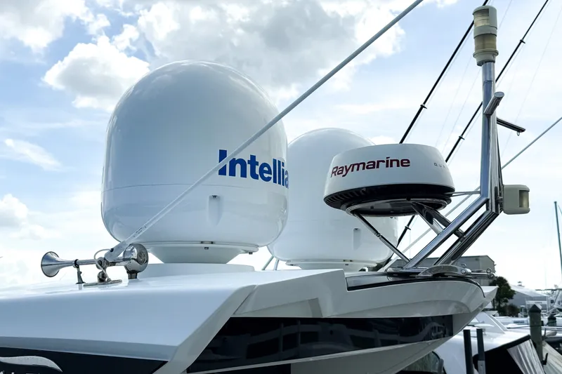 Slide: The Image of Radar and satellite equipment on a 2019 Galeon 485 HTS yacht under a cloudy sky. - 31