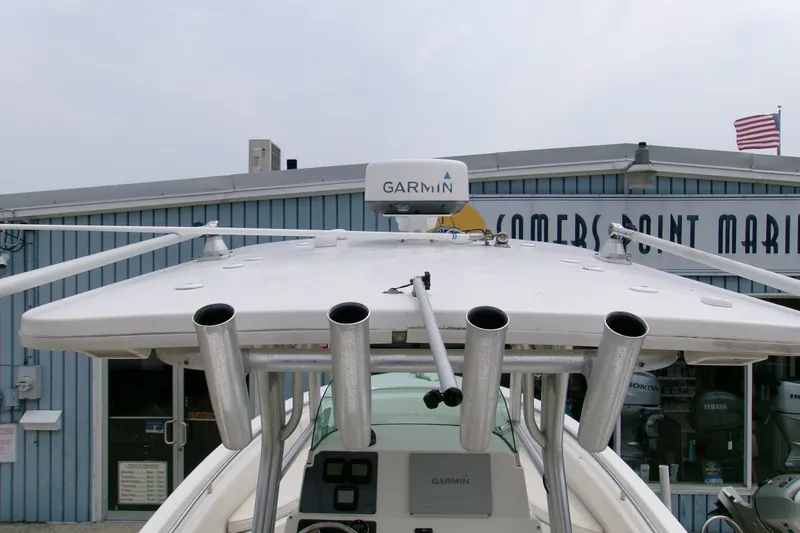 Slide: The Image of 2010 Robalo R240 Center Console boat with Garmin radar at marina. - 22