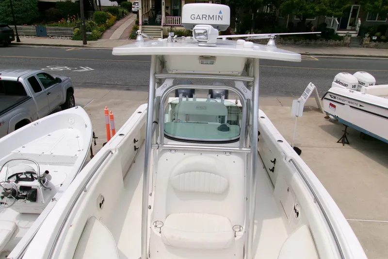 Slide: The Image of 2010 Robalo R240 Center Console boat with Garmin equipment, docked in a marina. - 41