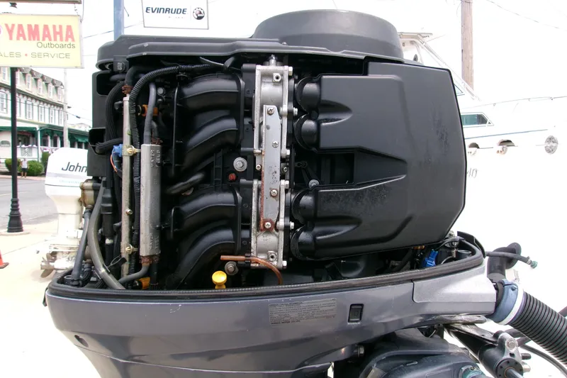 Slide: The Image of 2010 Robalo R240 Center Console boat engine, detailed view of internal components. - 26