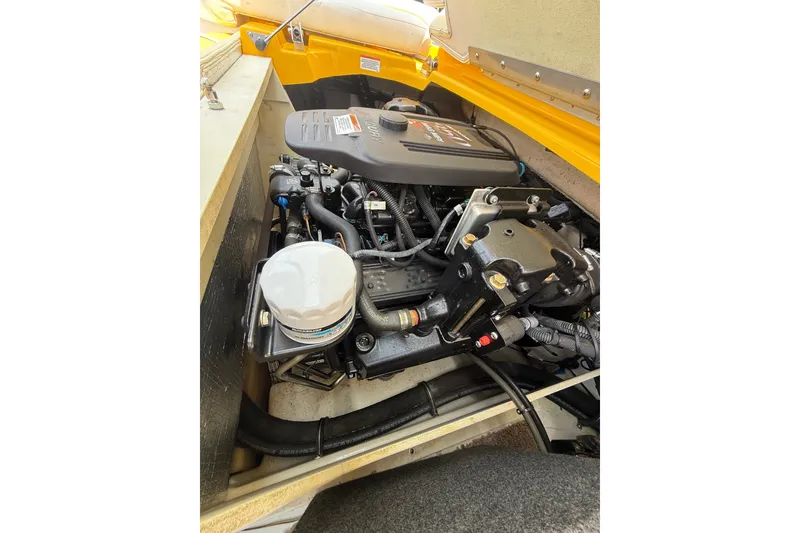 Slide: The Image of Engine compartment of a 2007 Crownline 21 SS boat, showcasing detailed components. - 36
