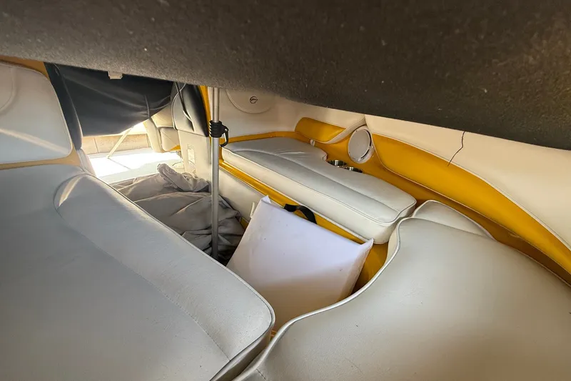Slide: The Image of Interior of 2007 Crownline 21 SS boat with white and yellow seating. - 13