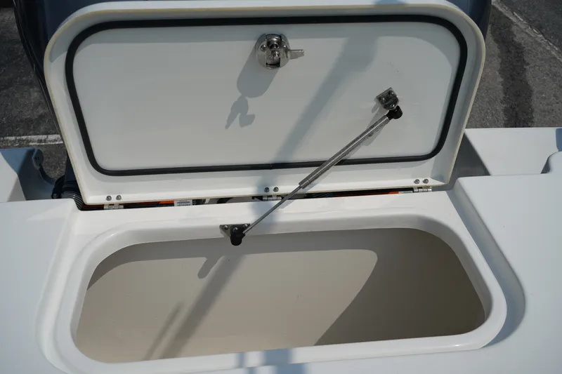 Slide: The Image of Open storage compartment on 2022 Sea Hunt Gamefish 25 boat. - 20