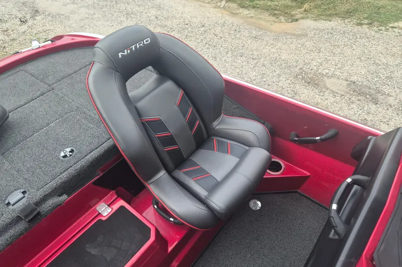 Slide: The Image of Red and black seat in 2021 Nitro Z20 boat interior. - 13