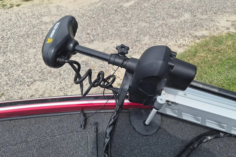 Slide: The Image of Trolling motor mounted on a 2021 Nitro Z20 boat, featuring a coiled cable. - 28