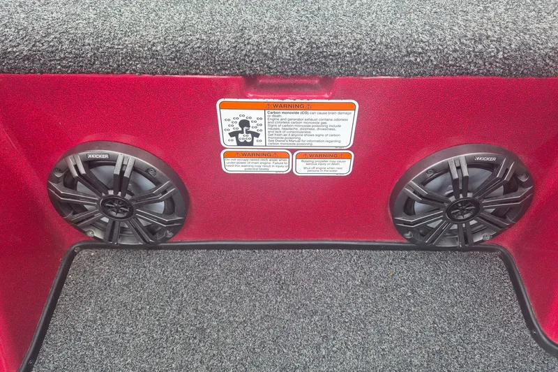 Slide: The Image of Interior of 2021 Nitro Z20 with Kicker speakers and warning label. - 20