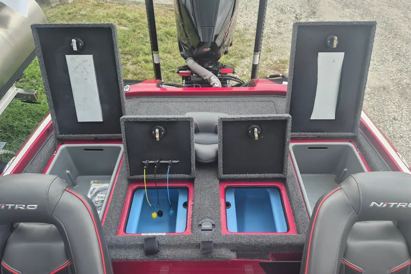 Slide: The Image of 2021 Nitro Z20 boat interior with storage compartments and seating. - 9