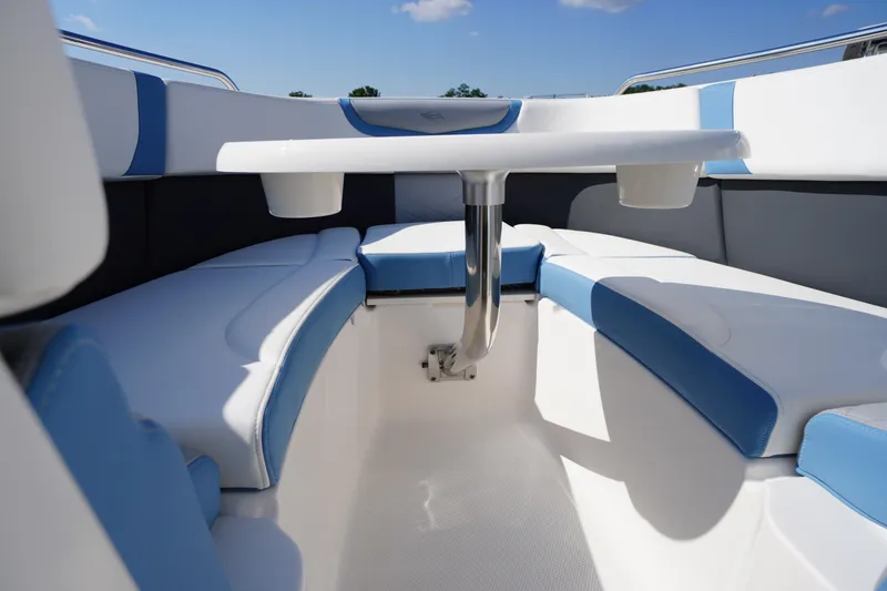 Slide: The Image of Interior view of 2026 Chaparral 270 OSX boat, featuring sleek seating and modern design. - 12