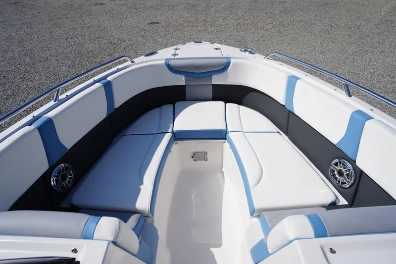 Slide: The Image of Luxurious seating area on the 2026 Chaparral 270 OSX boat, featuring blue and white upholstery. - 5