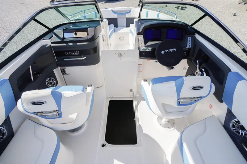 Slide: The Image of 2026 Chaparral 270 OSX boat interior with modern helm, seating, and sleek design. - 22