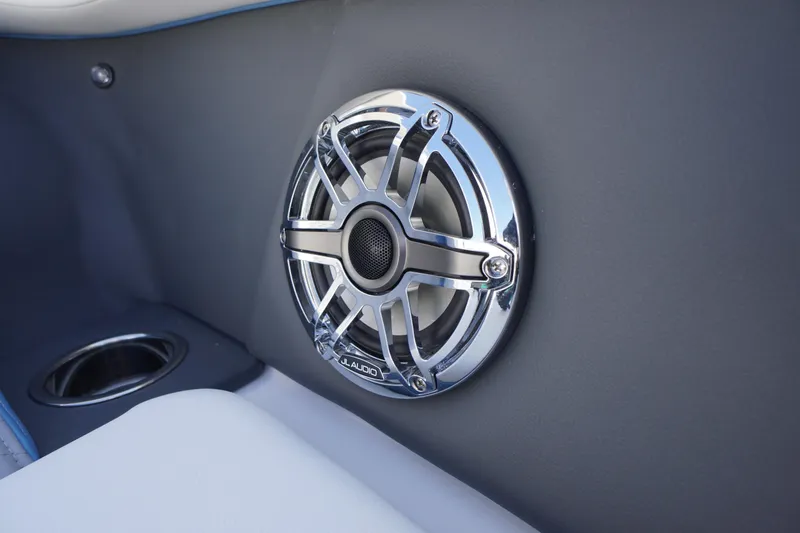 Slide: The Image of Chrome speaker detail on 2026 Chaparral 270 OSX boat interior. - 18