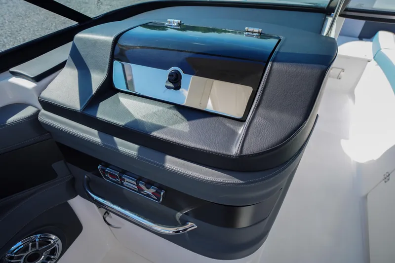 Slide: The Image of Dashboard of 2026 Chaparral 270 OSX boat with sleek design and modern controls. - 29