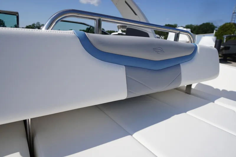 Slide: The Image of 2026 Chaparral 270 OSX boat seat with sleek white and blue design. - 57